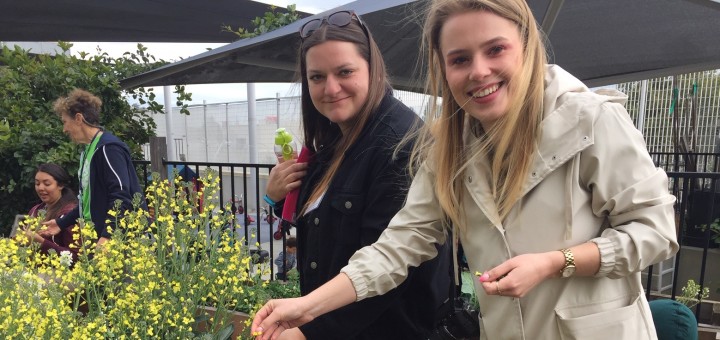 Krakow JCC Teachers Marika and Magda enjoy the OFJCC Leslie Family Preschool garden.