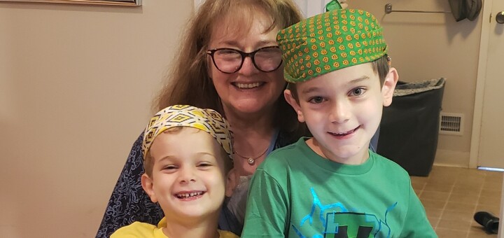 Gideon, 5 (left) and Jonah, 8 (right) dressed up for OFJCC J-Camp Colors Wars Day (pictured with their Savta Ruth)